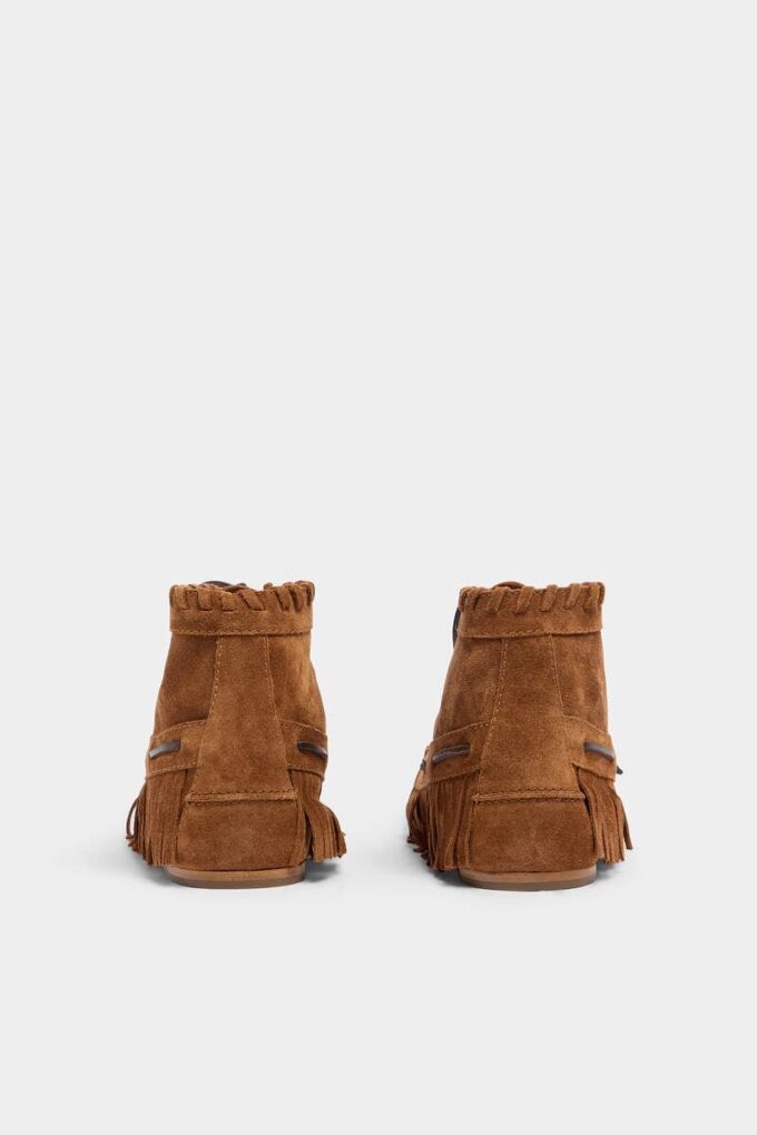 Botas con cordones, trenzas y abalorios Botas con cordones, trenzas y abalorios