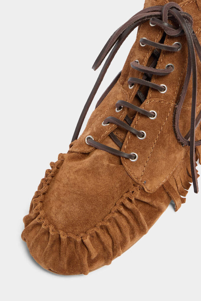 Botas con cordones, trenzas y abalorios Botas con cordones, trenzas y abalorios