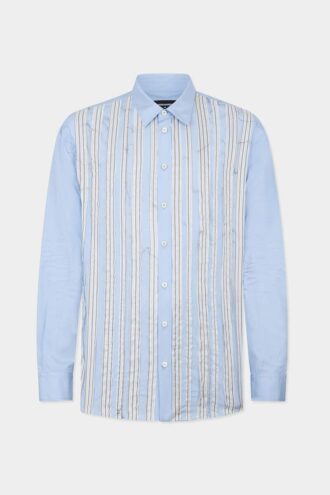 Camisa de hombros caídos con corte sin rematar