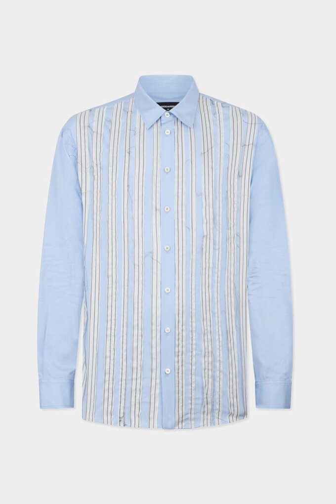 Camisa de hombros caídos con corte sin rematar