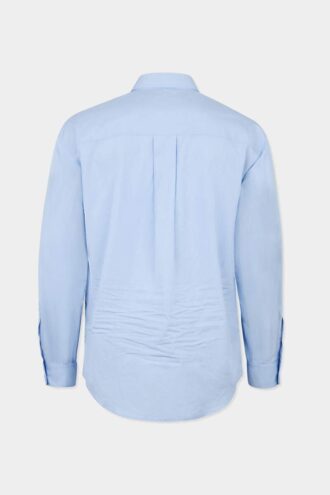 Camisa de hombros caídos con corte sin rematar