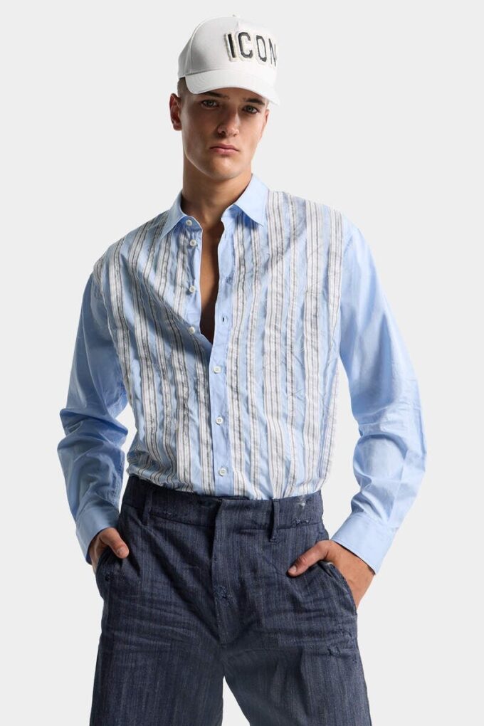Camisa de hombros caídos con corte sin rematar