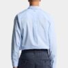 Camisa de hombros caídos con corte sin rematar