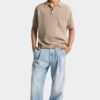 Pantalón vaquero de lavado claro y limpio con un pliegue Pantalón vaquero de lavado claro y limpio con un pliegue