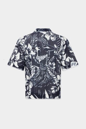 Polo de manga corta con estampado de flores danzantes en Pantalones Cortos Polo de manga corta con estampado de flores danzantes en Pantalones Cortos
