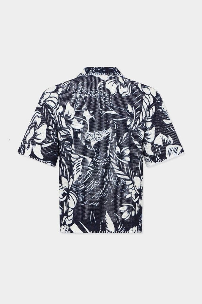 Polo de manga corta con estampado de flores danzantes en Pantalones Cortos Polo de manga corta con estampado de flores danzantes en Pantalones Cortos
