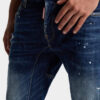 Vaqueros Biker Jean con lavado de manchas rojas medianas Vaqueros Biker Jean con lavado de manchas rojas medianas