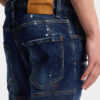 Vaqueros Biker Jean con lavado de manchas rojas medianas Vaqueros Biker Jean con lavado de manchas rojas medianas
