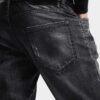 Vaqueros slim twist con lavado negro neblina